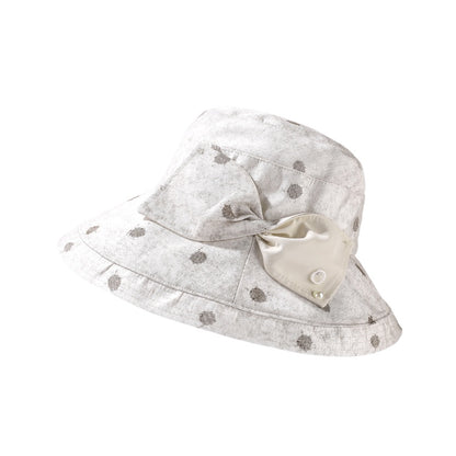 Haila polka dot bow brim hat folded to show flexibility of material