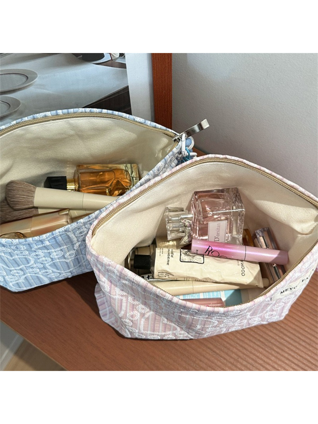 Cosbai cosmetic pouch displayed with matching heart print accessories