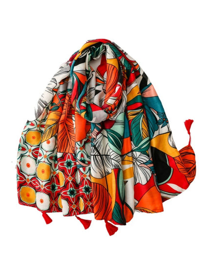 Scarvii bold tropical print scarf with colorful leaves and tassels on edges