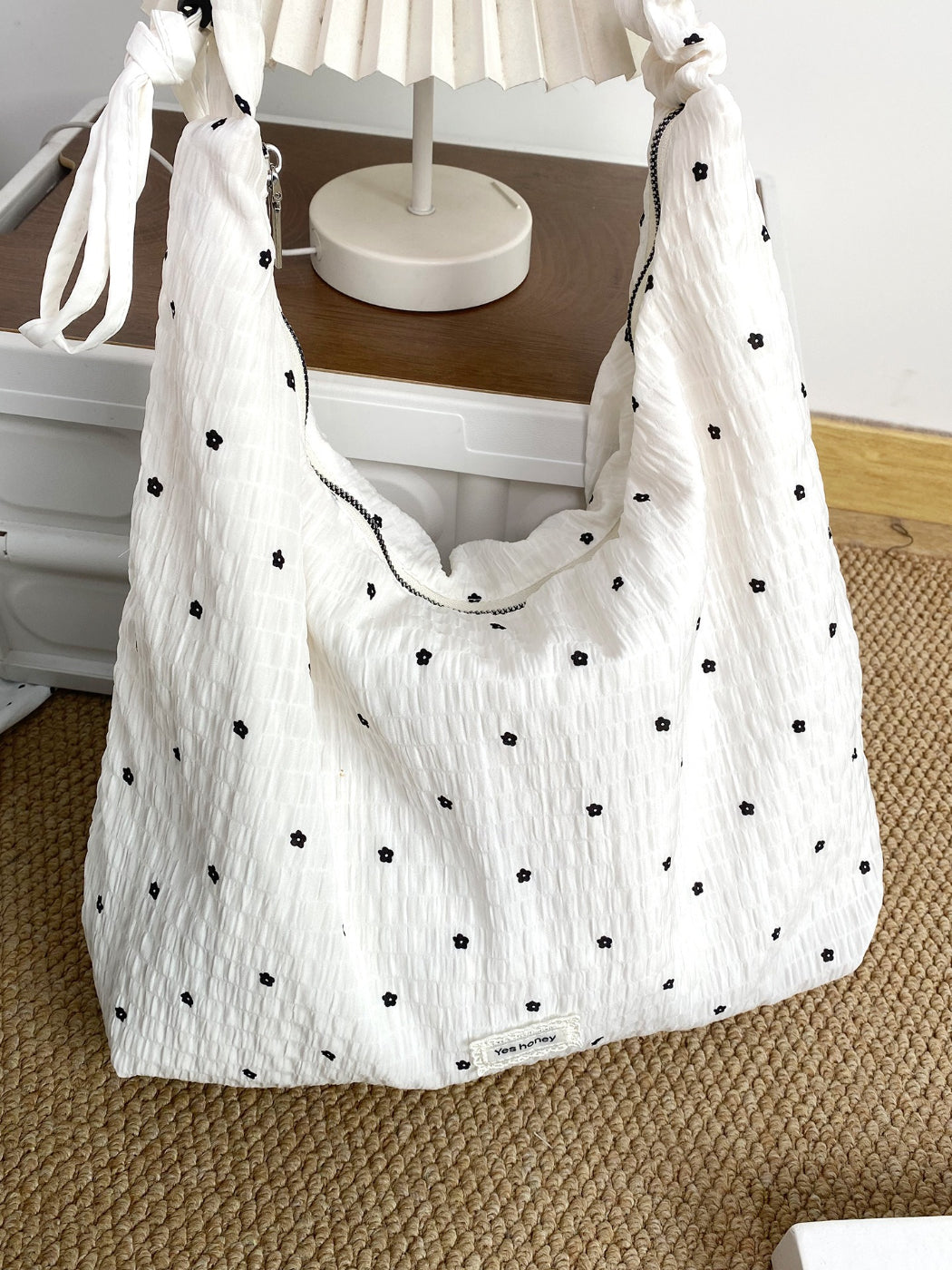 Cosbai ruched strap slouchy shoulder bag placed on wooden surface