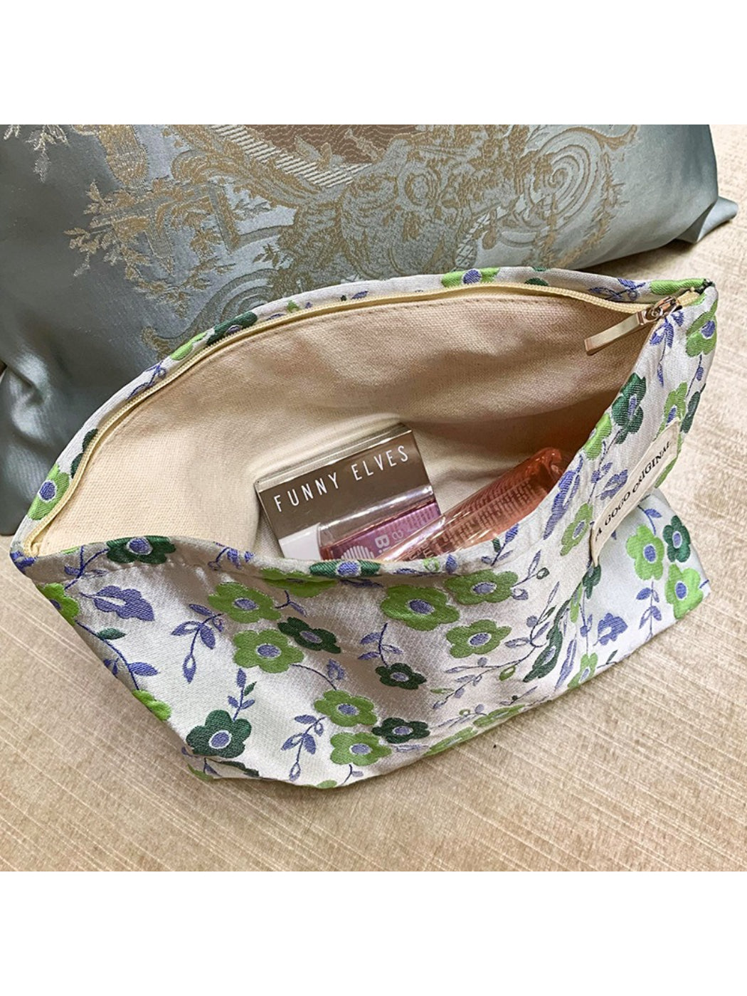Cosbai makeup pouch standing upright showing full floral design and shape