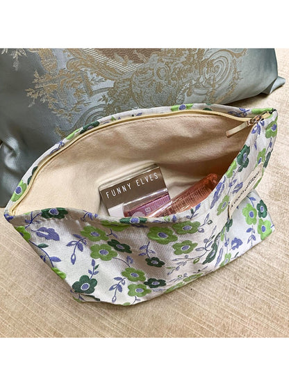 Cosbai makeup pouch standing upright showing full floral design and shape