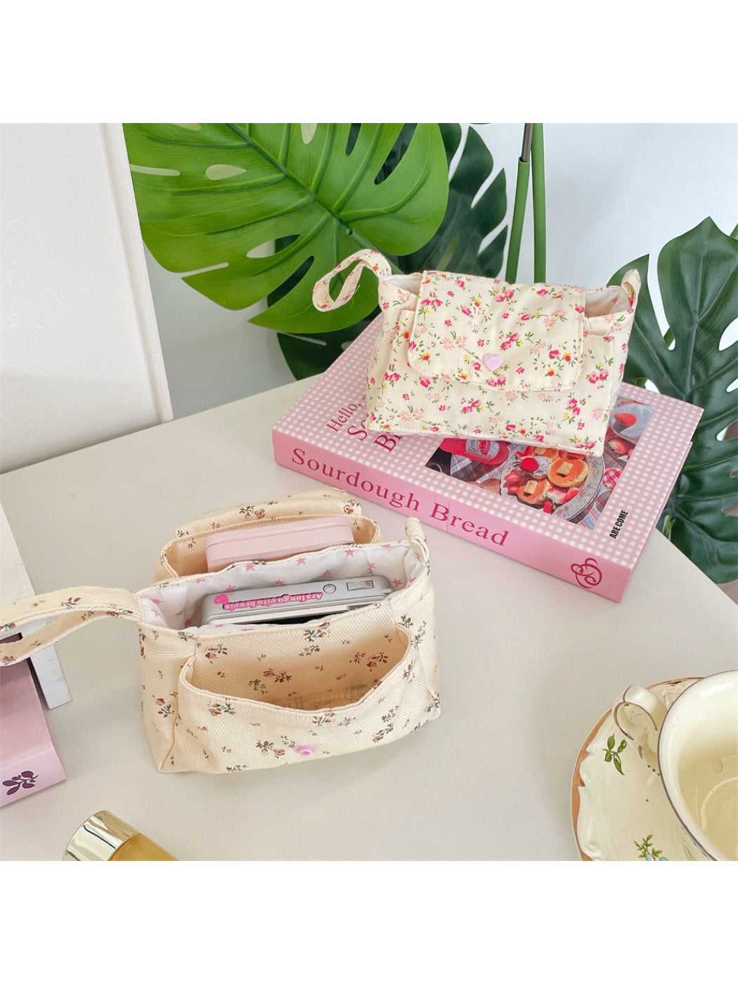 Side view of Cosbai Ditsy Floral Mini Handle Bag showing compact shape and floral pattern