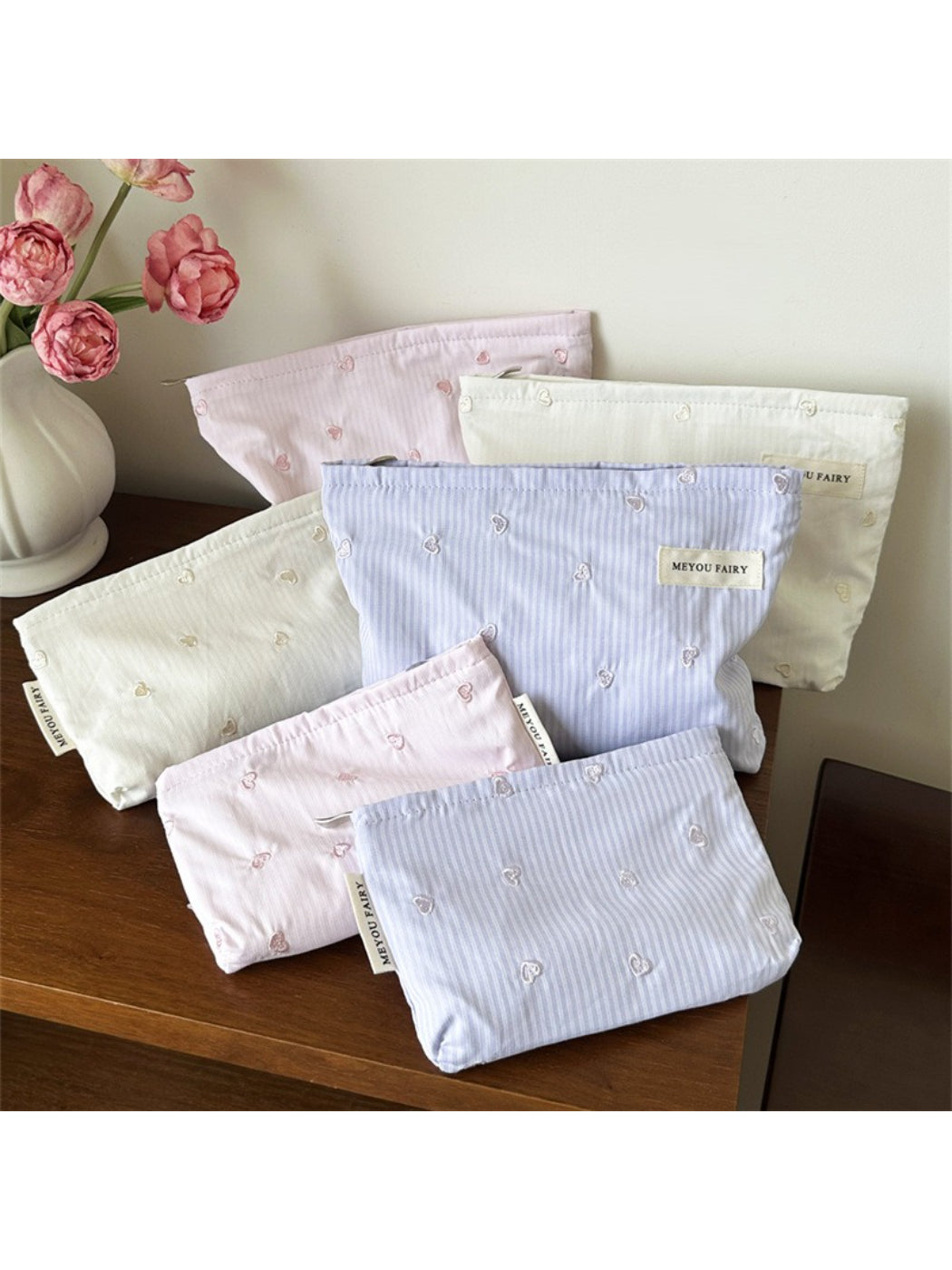 Cosbai Soft Stripe Heart Makeup Organizer Bag front view with heart pattern and