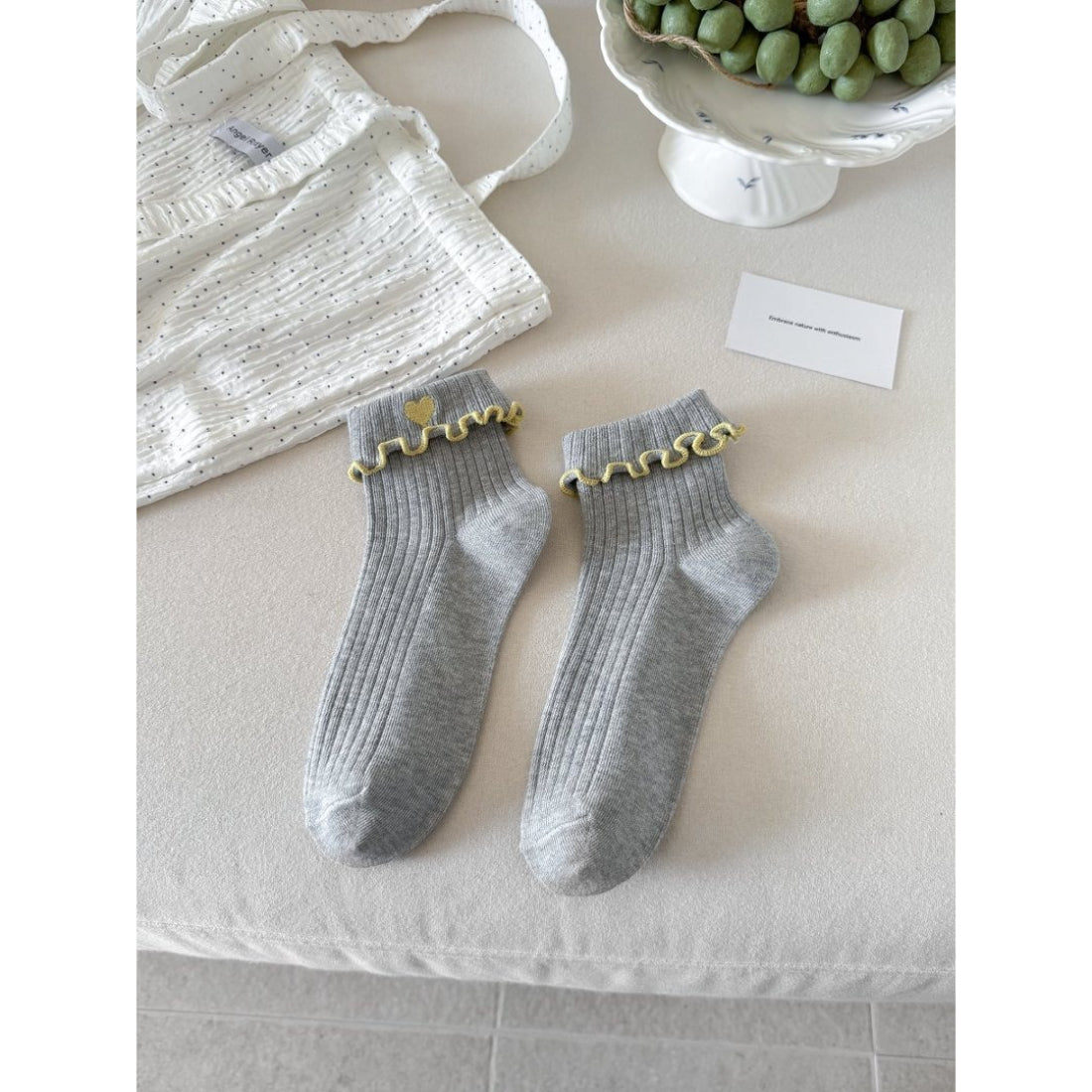 Rufia socks folded to show heart pattern and soft material