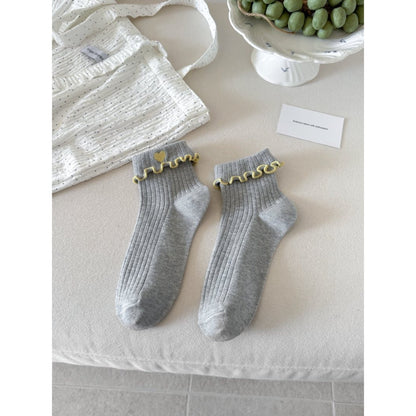 Rufia socks folded to show heart pattern and soft material