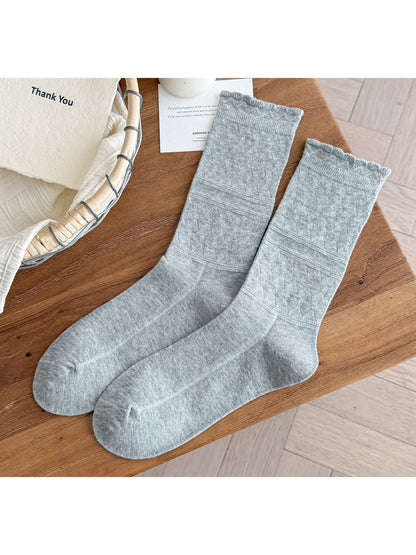 Rufia soft scallop knit socks in muted green color shown from top view