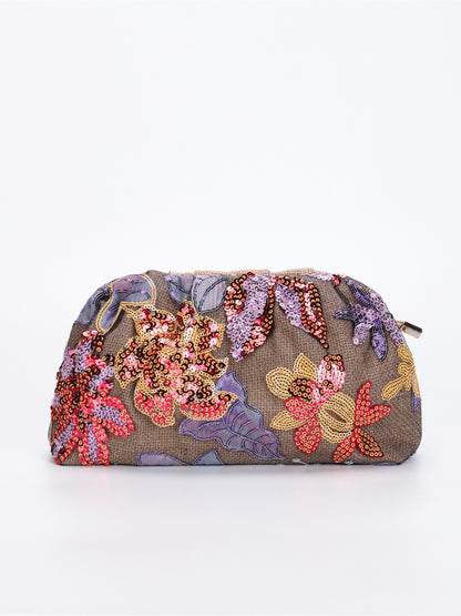 Cosbai floral sequin clutch bag photographed under soft lighting to highlight shimmer
