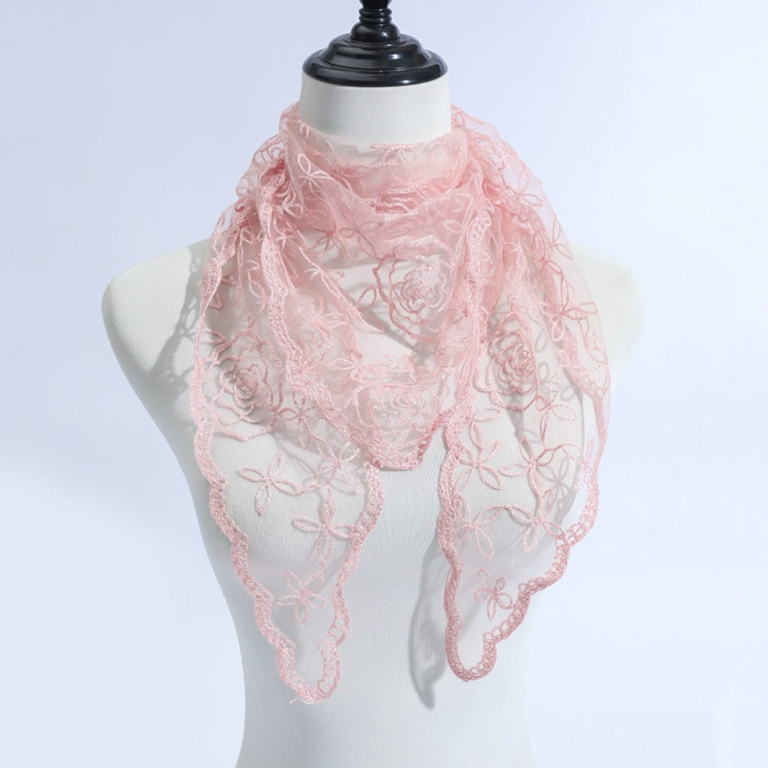 Model wearing Haila veil scarf loosely tied around the neck