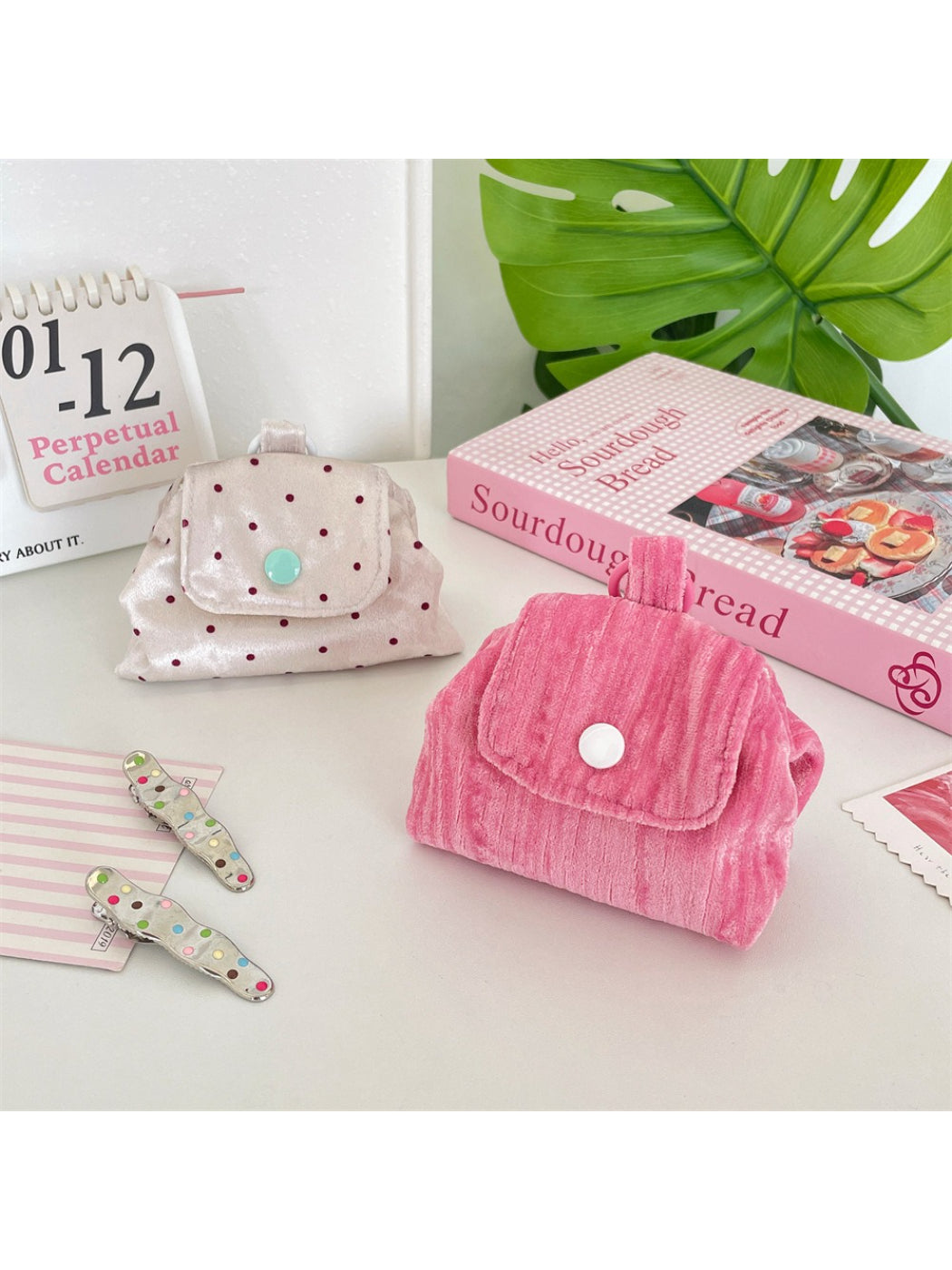 Close-up of button detail on Cosbai Soft Dot Button Coin Purse in beige
