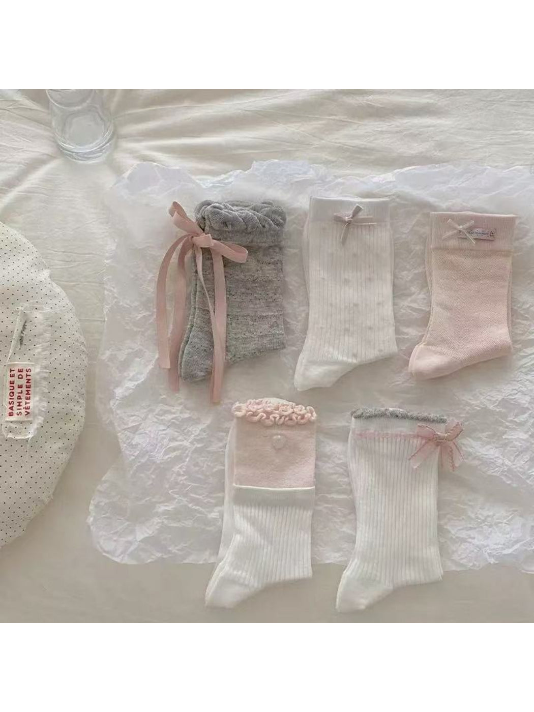 Model wearing Rufia Romantic Bow Texture crew socks with casual shoes