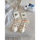 Side view of Rufia Classic Fine Texture Crew Socks highlighting ribbed cuff