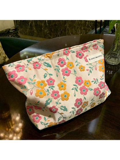 Interior view of the Cosbai floral makeup pouch showing spacious