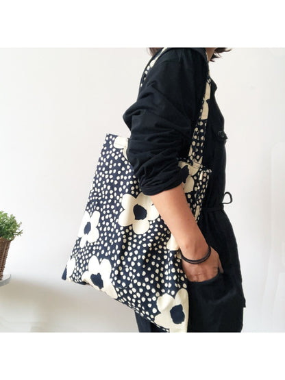 Cosbai tote bag showing spacious interior and black lining
