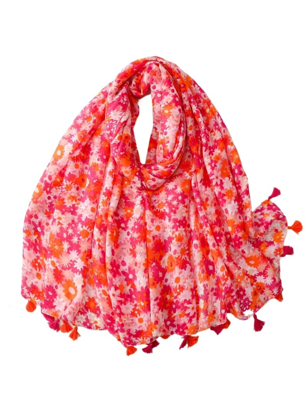 Bright ditsy floral wrap scarf draped over shoulders on model