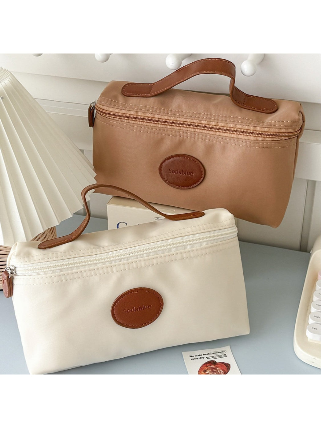 Close-up of Cosbai travel beauty pouch and fabric texture