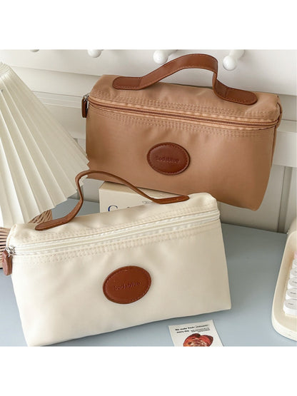 Close-up of Cosbai travel beauty pouch and fabric texture