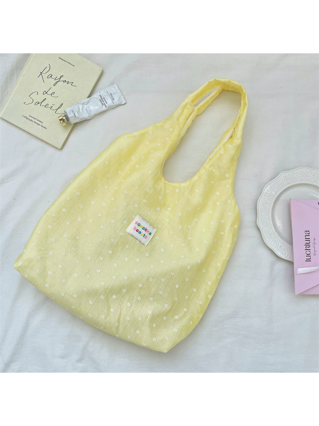 Close-up of Cosbai Summer Bloom tote bag showing floral pattern and stitching details