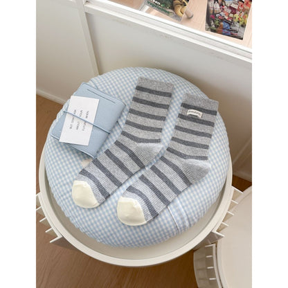 Rufia socks folded to display stripe design and soft material