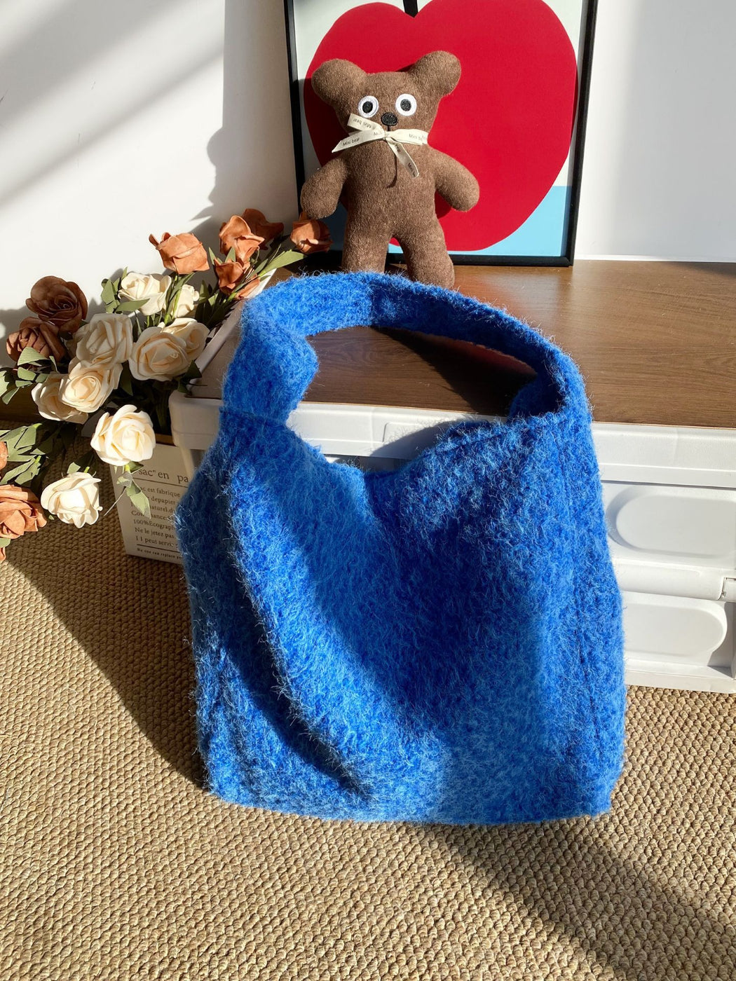 Cosbai plush glitter shoulder bag worn over shoulder by model