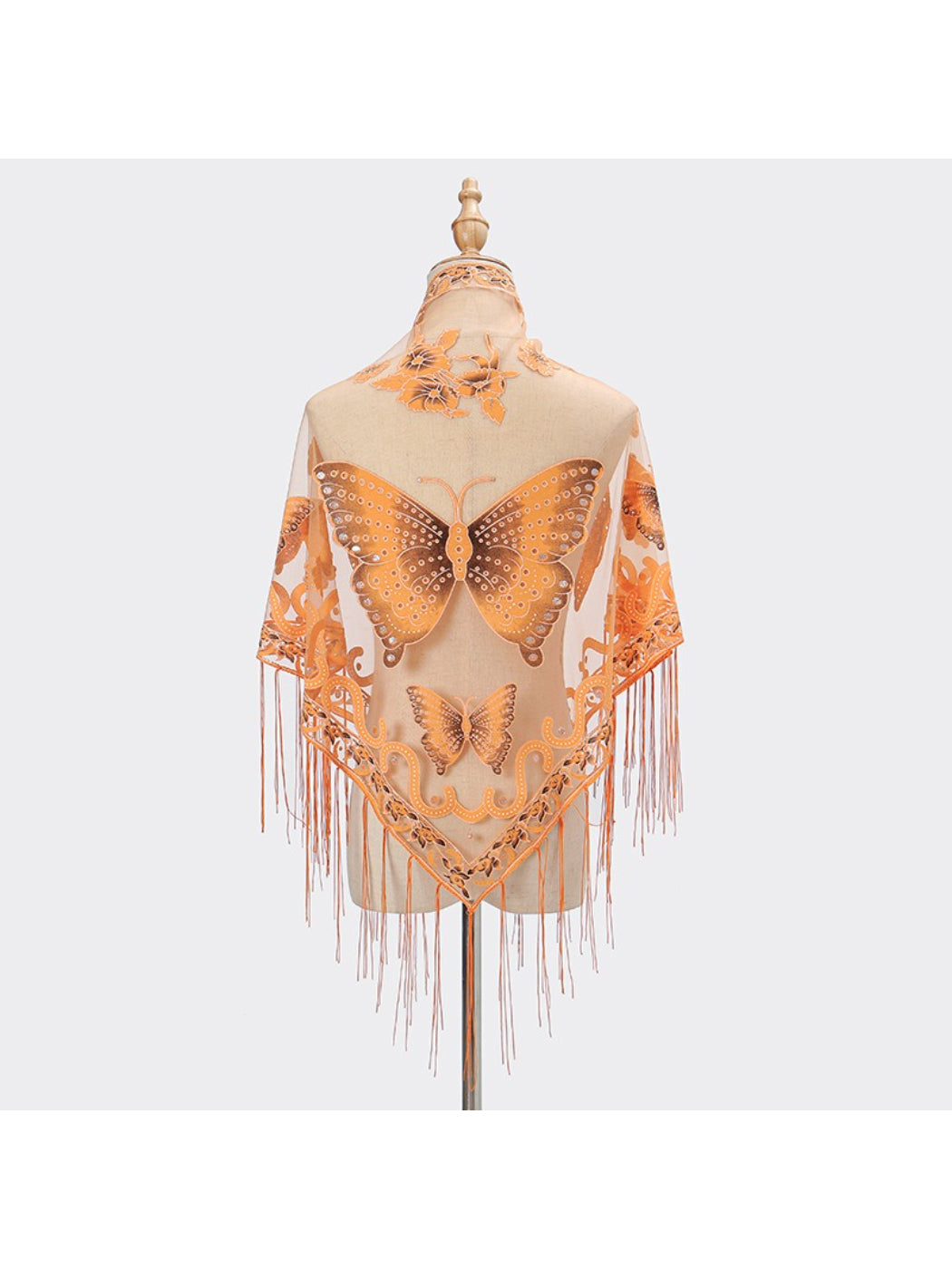 Model showcasing Scarvii Butterfly Fringe Triangle Scarf tied at front with butterfly print visible
