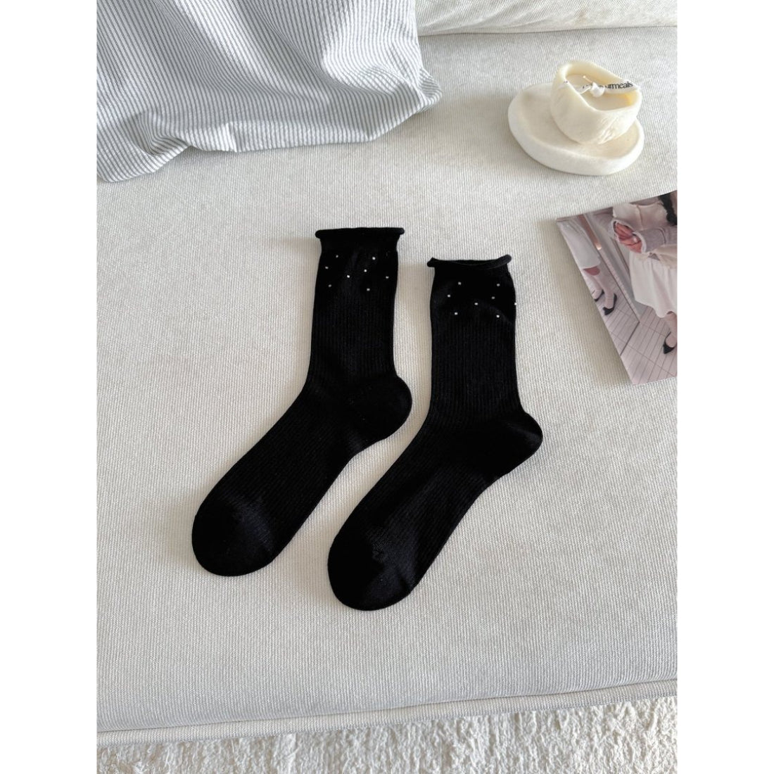 Model wearing Rufia Everyday Turn Cuff Knit Socks with rolled cuff and casual outfit