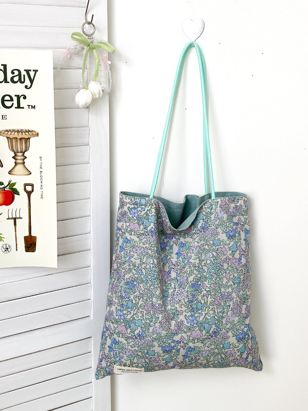 Cosbai tote bag with patchwork floral design displayed on a white background