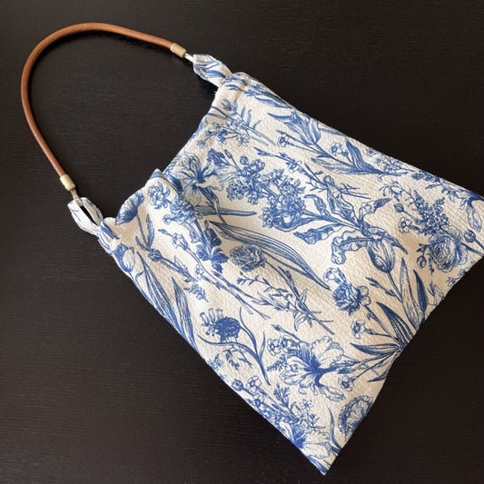 Blue and cream garden print soft hobo bag with rounded strap