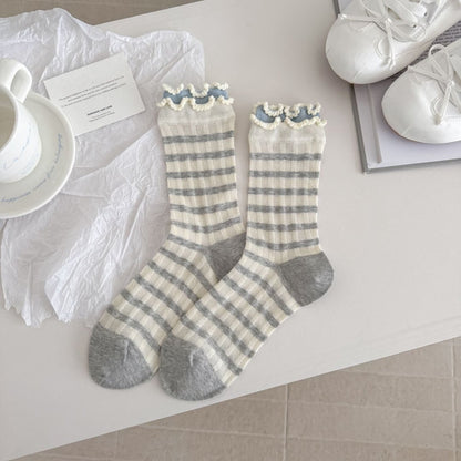 Rufia crew socks displayed flat highlighting knit texture and length