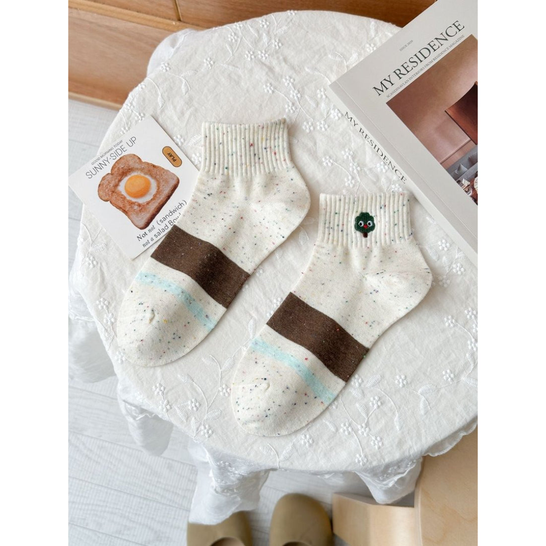Top view of Rufia casual crew socks showing speckled knit pattern
