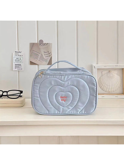 Side view of Cosbai travel cosmetic organizer highlighting sturdy handle and