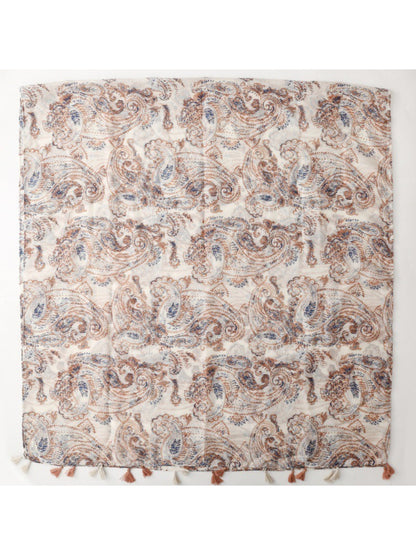 Scarvii shawl folded to show vibrant paisley design and fringe tassels