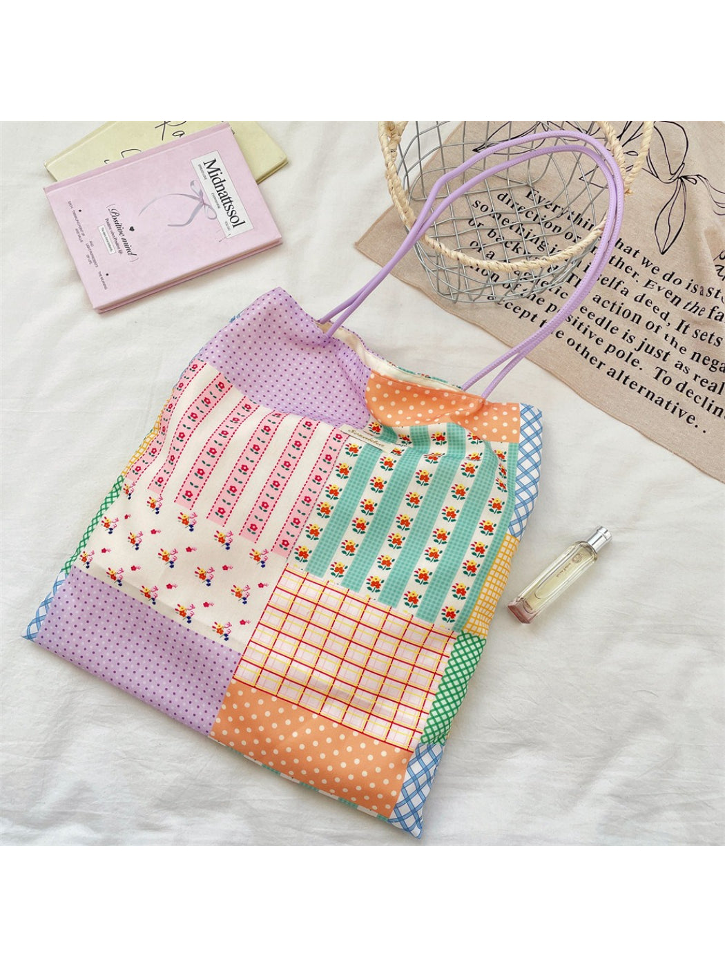 Close-up of Cosbai pastel patchwork shopper tote fabric texture and color variations
