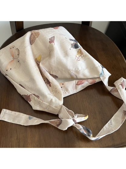 Cosbai butterfly print tie shoulder bag displayed on a white background