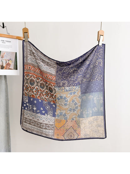 Scarvii scarf folded with visible intricate patchwork details