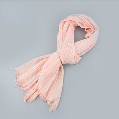 Scarvii scarf hanging with natural light highlighting colors