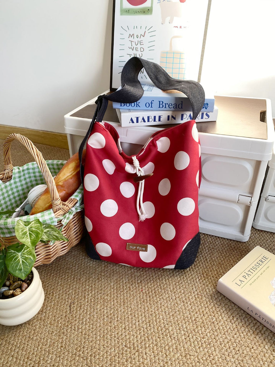 Close-up of Cosbai polka dot crossbody bag fabric texture and drawstring detail