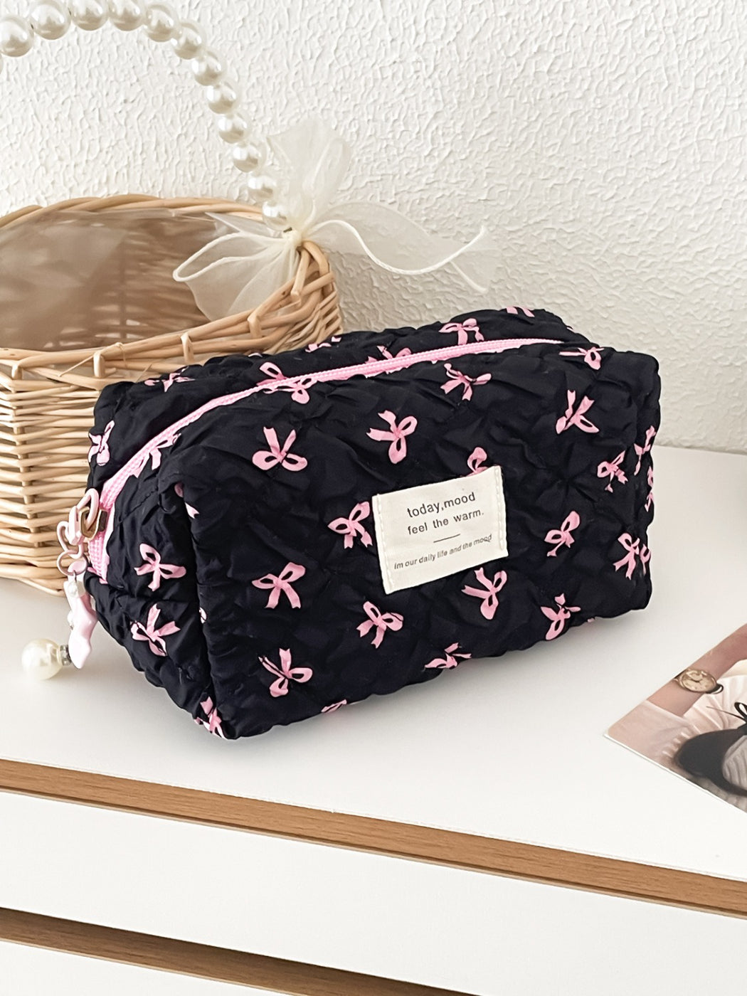 Cosbai Ribbon Print Zip Organizer filled with stationery items inside compartments