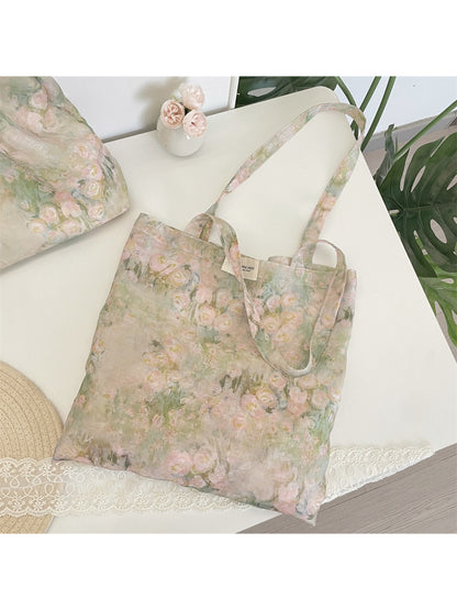 Close-up of blush floral shoulder tote showing fabric texture and floral design