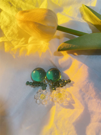 Earwish floral earrings displayed on a white background showing full length and design