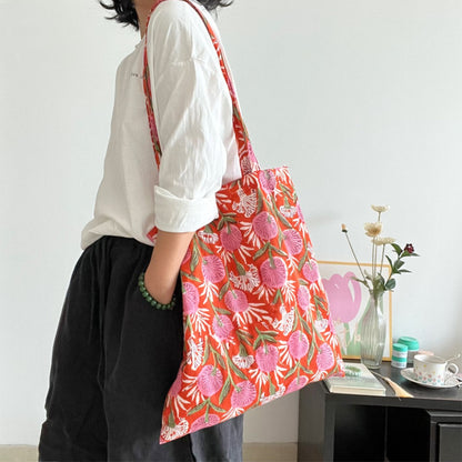 Side view of Cosbai Warm Floral Carryall Tote showing spacious interior and floral design
