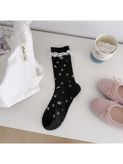 Model wearing Rufia Romantic Lace Cuff Crew Socks paired with casual shoes