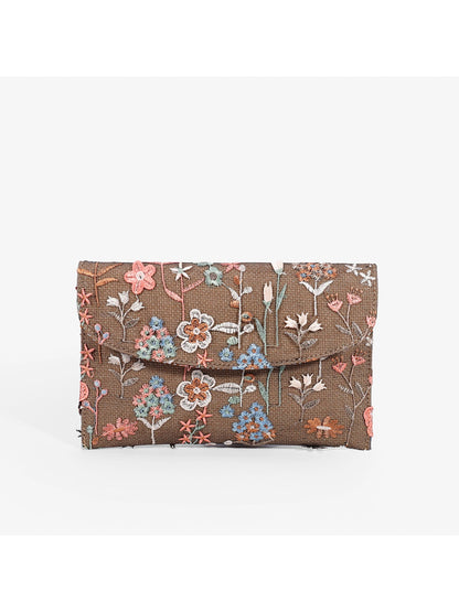 Cosbai floral clutch bag paired with matching floral dress