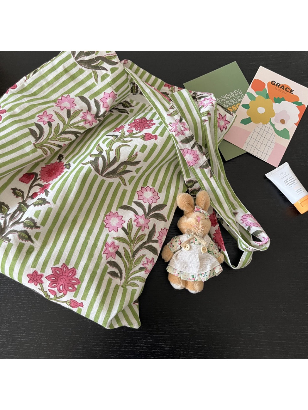 Cosbai tote bag open to display spacious interior with floral stripe design