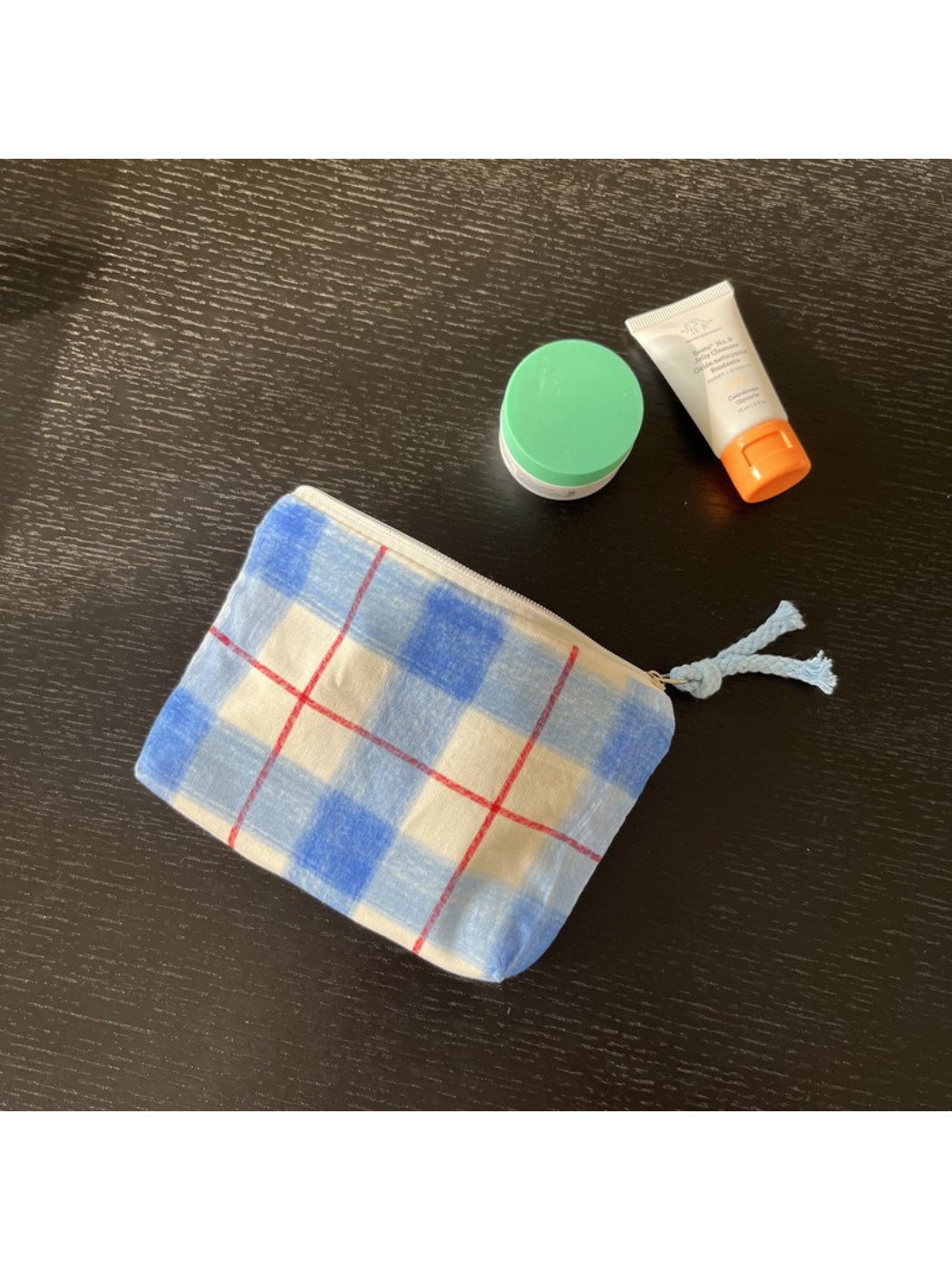 Cosbai mini pouch bag open, displaying interior lining