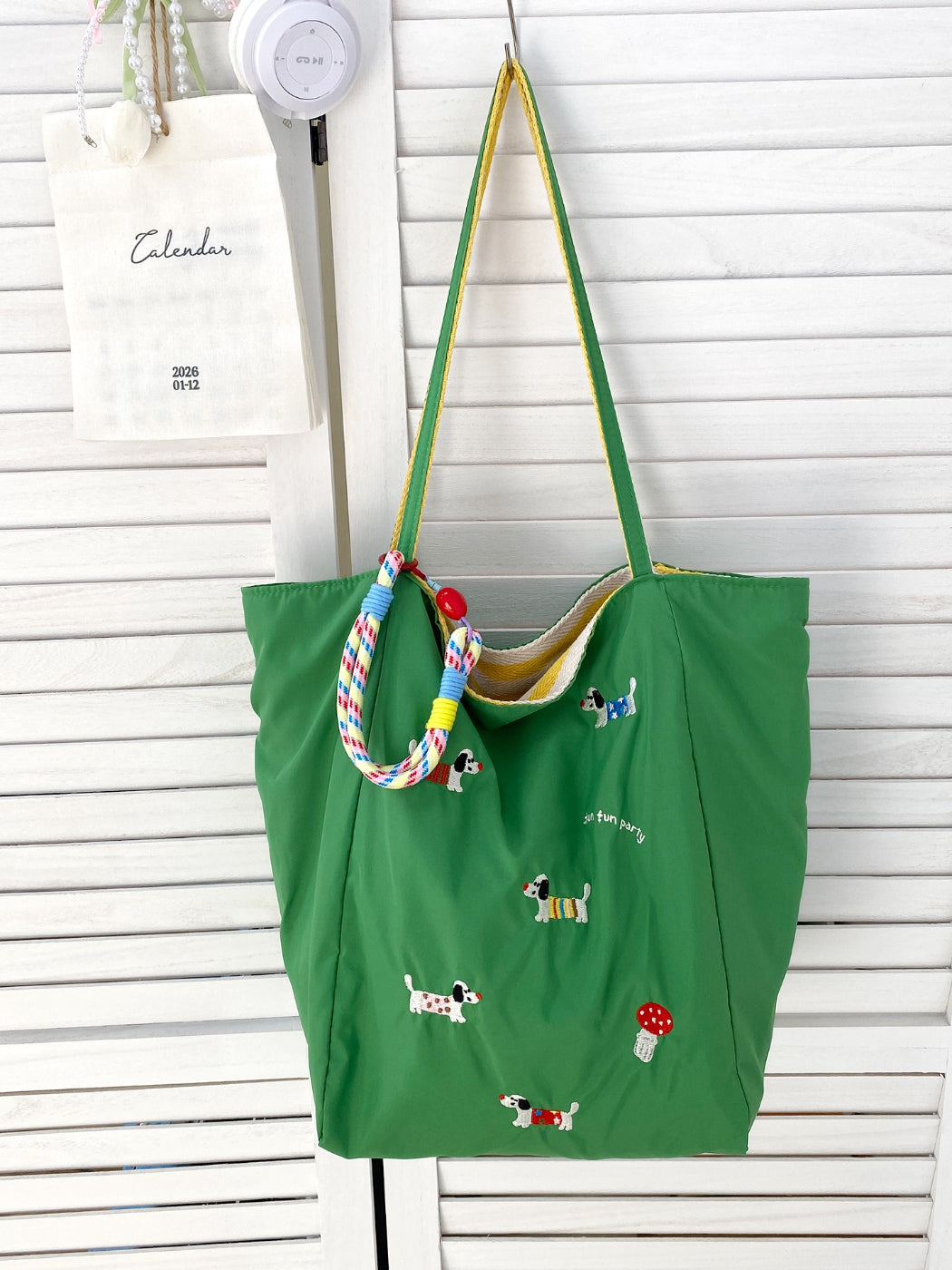 Cosbai puppy print tote bag with beige handles against plain white background