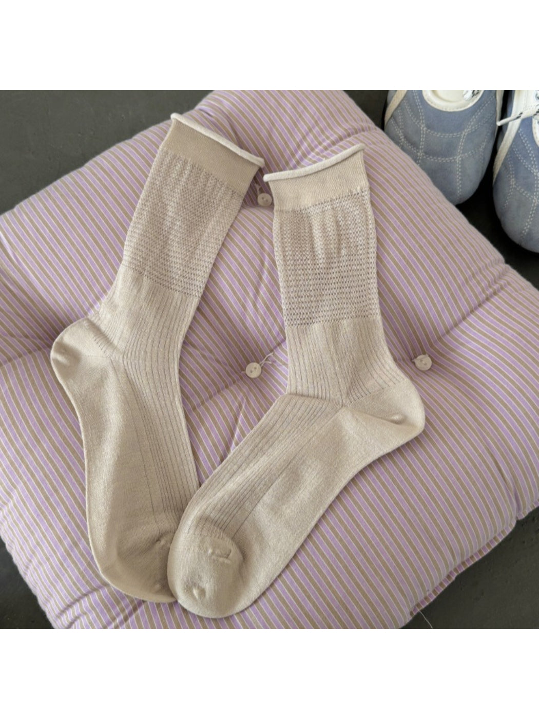 Model wearing Rufia soft knit everyday crew socks with rolled-up pants
