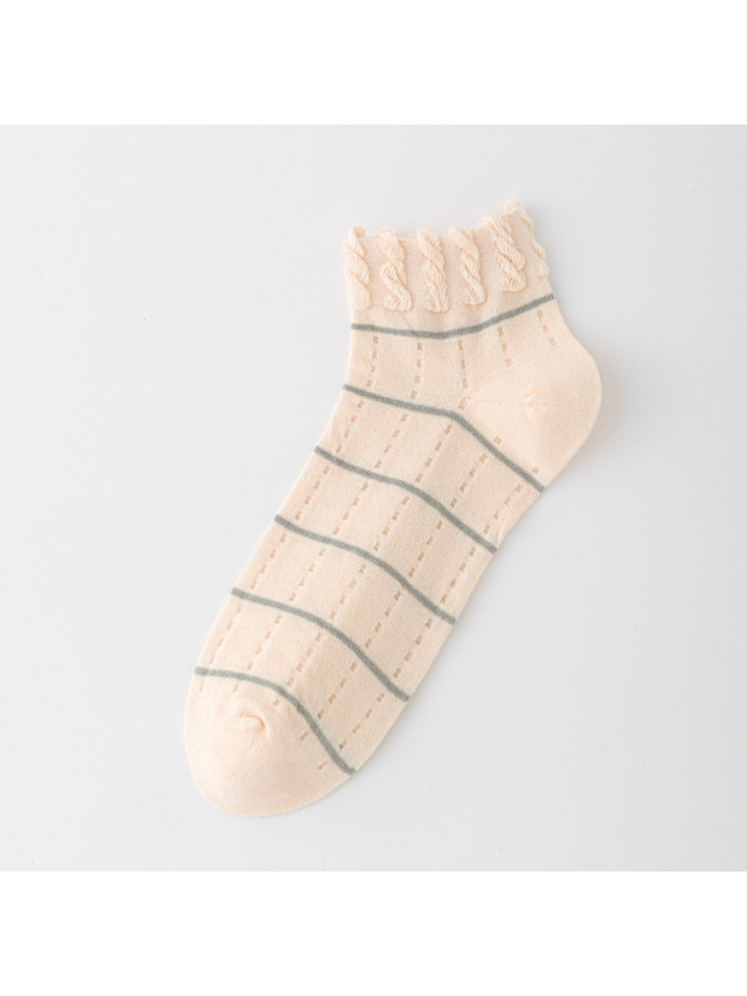 Close-up of Rufia ankle socks frill trim and striped pattern on fabric