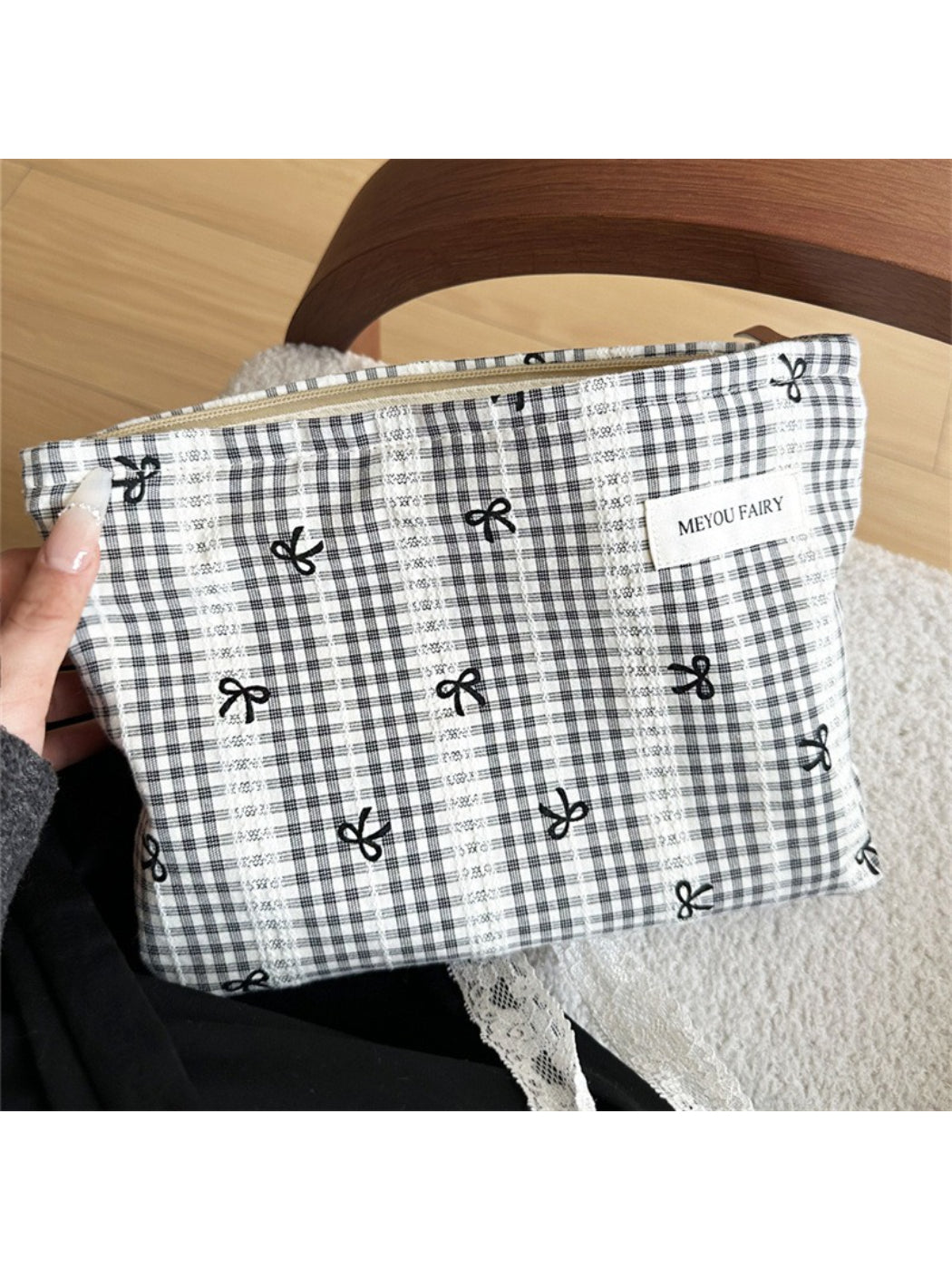 Cosbai gingham bow makeup pouch displayed on a white surface