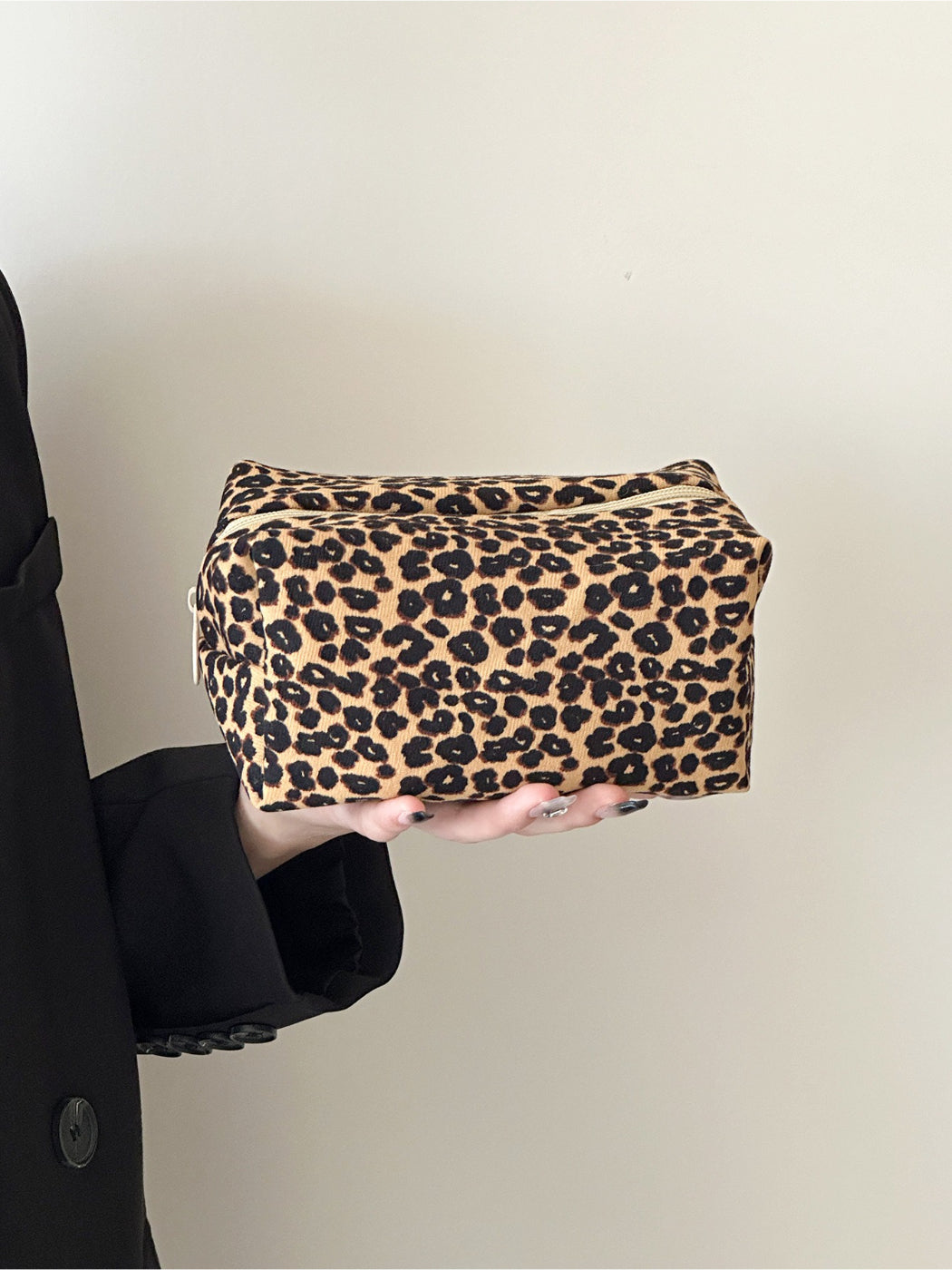 Cosbai travel makeup bag displayed with matching leopard print accessories
